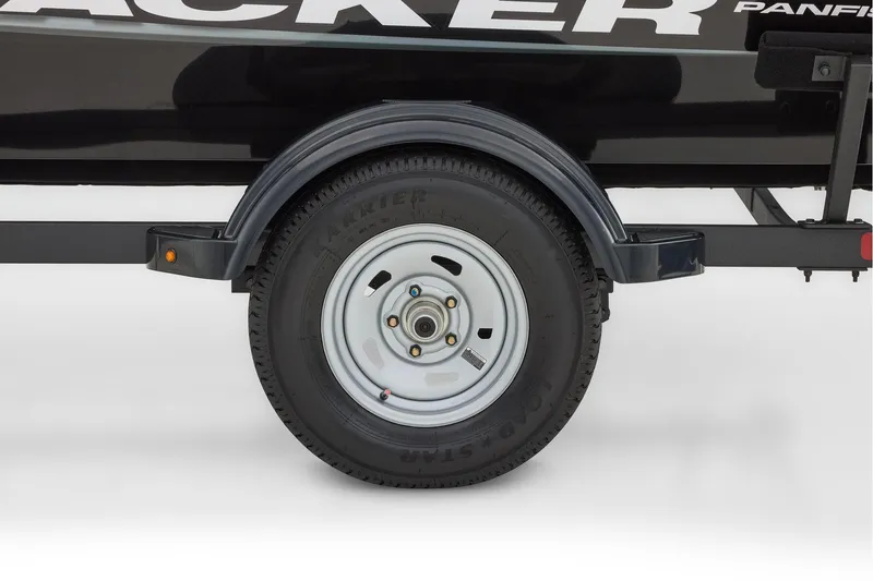 Slide: The Image of 2026 Tracker Panfish 17 boat storage compartment with open lid, showcasing interior space. - 11