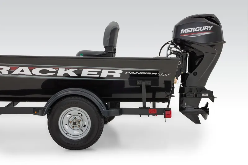 Slide: The Image of 2026 Tracker Panfish 17 boat interior with seating and Garmin equipment. - 9