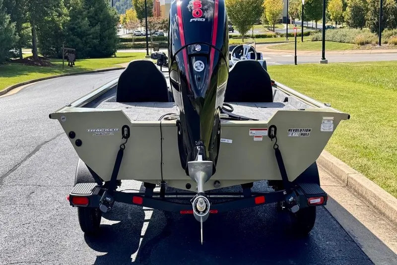 Slide: The Image of 2026 Tracker Pro Team 195 boat on trailer, parked on a sunny day. - 4