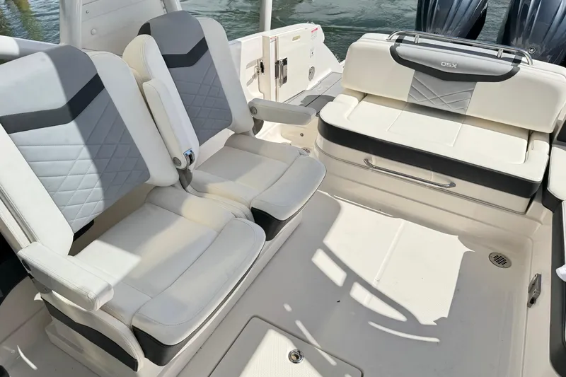 Slide: The Image of 2022 Chaparral 280 OSX boat interior with stylish seating and modern design. - 17
