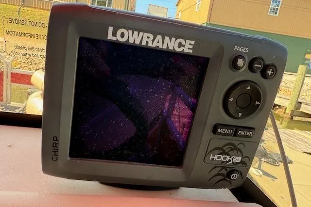Slide: The Image of Lowrance fish finder on 2017 Sun Tracker Bass Buggy 18 DLX boat dashboard. - 12