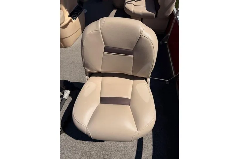 Slide: The Image of 2017 Sun Tracker Bass Buggy 18 DLX beige boat seat on deck. - 9
