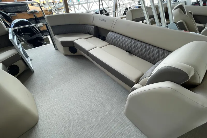 Slide: The Image of Luxurious seating on 2026 Harris Cruiser 230 pontoon boat, featuring elegant upholstery and spacious design. - 14
