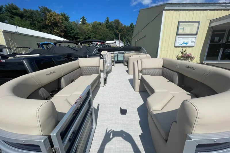 Slide: The Image of 2026 Harris Cruiser 230 CW pontoon boat with spacious seating and modern design. - 8