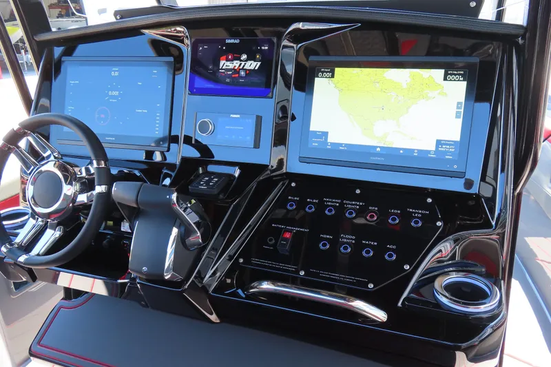 Slide: The Image of 2026 Sunsation 32CCX boat dashboard with advanced navigation and control systems. - 10