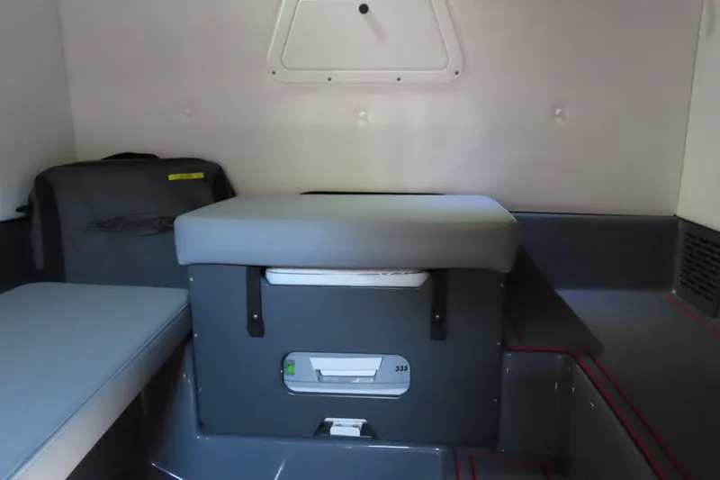 Slide: The Image of 2026 Sunsation 32CCX cabin interior with seating and storage. - 14