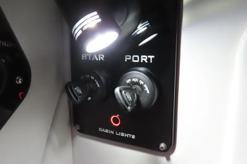 Slide: The Image of Control panel of 2026 Sunsation 32CCX boat with illuminated cabin lights. - 15