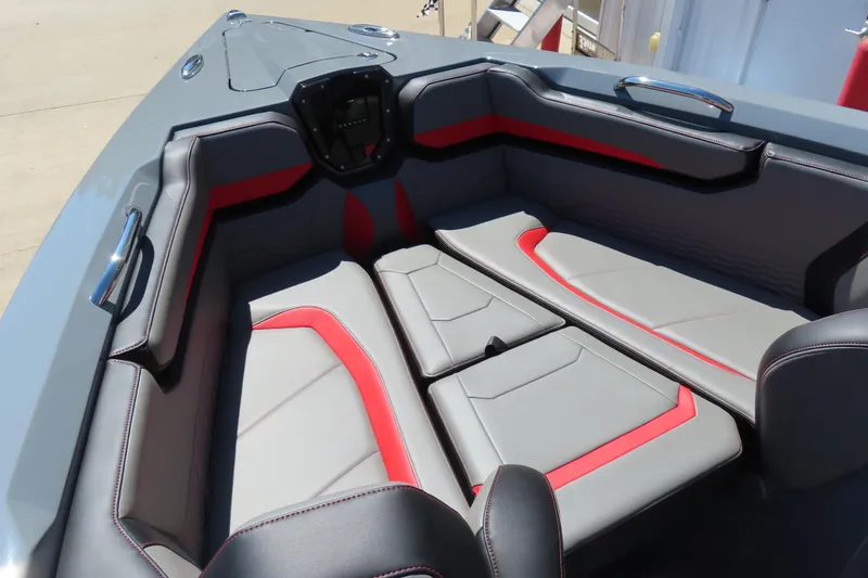 Slide: The Image of 2026 Sunsation 32CCX boat interior with gray and red seating, modern design. - 16