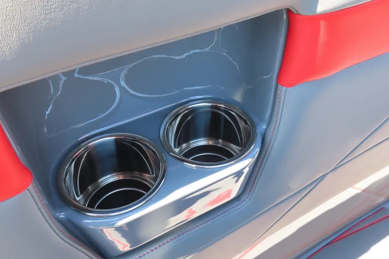Slide: The Image of 2026 Sunsation 32CCX boat interior with dual stainless steel cup holders. - 22