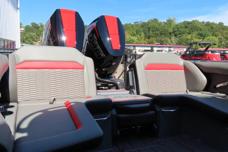 Slide: The Image of 2026 Sunsation 32CCX boat interior with red and gray seating, dual engines visible. - 25