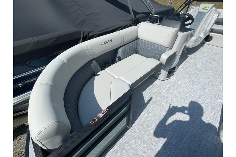 Slide: The Image of 2026 Harris Cruiser 210 boat interior with luxurious seating and modern design. - 10