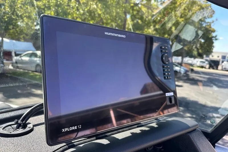 Slide: The Image of Humminbird Xplore 12 display on 2025 Lund 1875 Pro-V boat dashboard. - 24