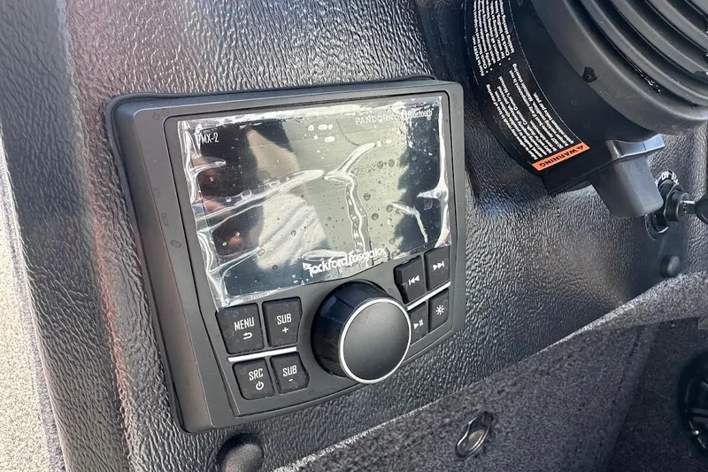 Slide: The Image of Control panel of 2025 Lund 1875 Pro-V boat with Rockford Fosgate audio system. - 26