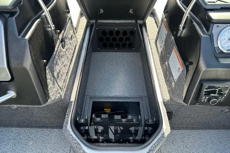 Slide: The Image of 2025 Lund 1875 Pro-V boat interior storage compartment with organized layout and modern design. - 33