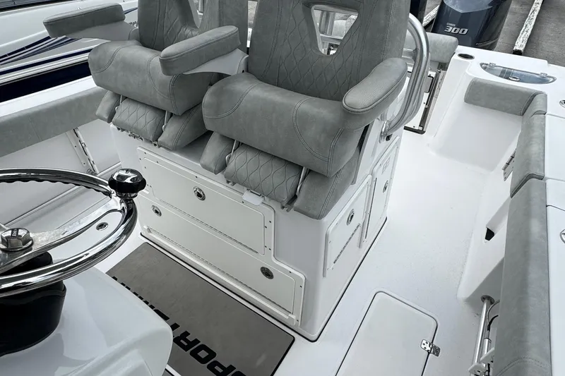 Slide: The Image of 2020 Sportsman Open 282TE Center Console with dual seats and steering wheel. - 11