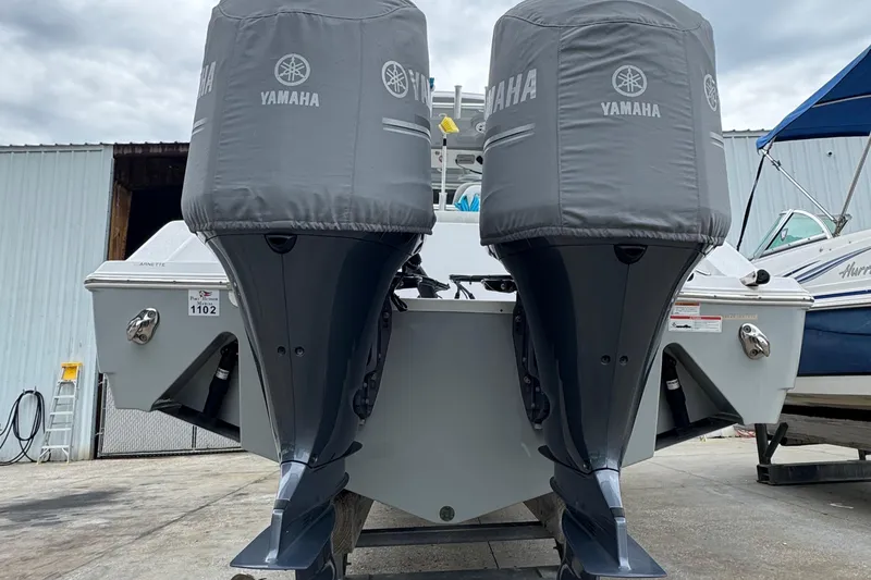 Slide: The Image of 2020 Sportsman Open 282TE Center Console with twin Yamaha outboard motors. - 30