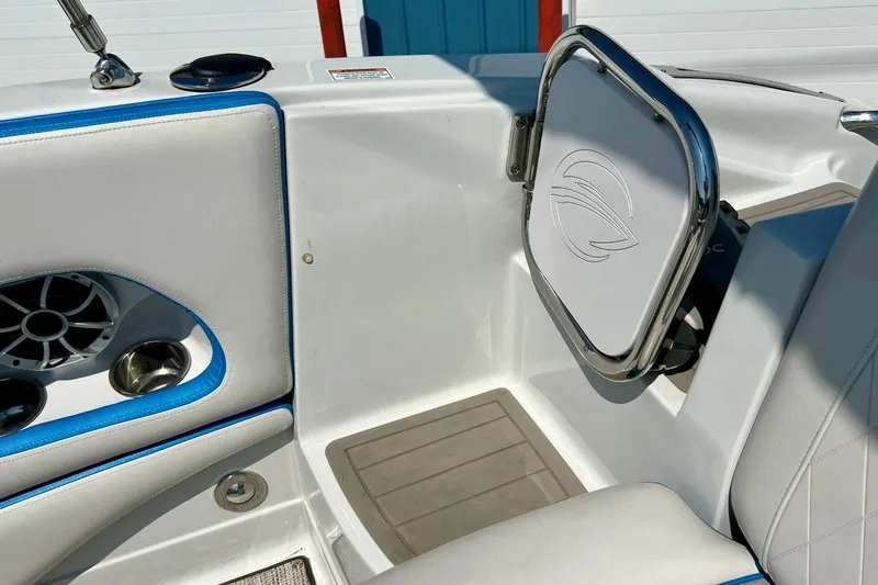 Slide: The Image of 2020 Crownline Eclipse E205 XS Fish boat interior with speaker and cup holder. - 22