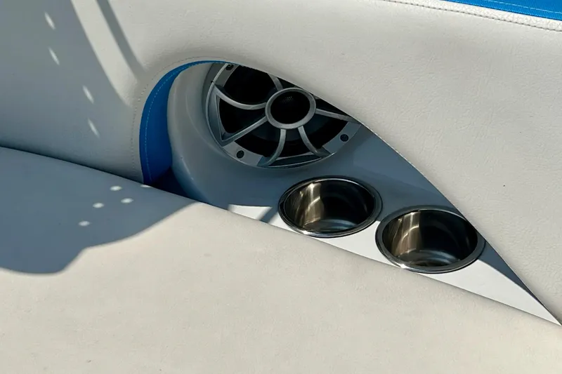 Slide: The Image of Crownline Eclipse E205 XS Fish 2020 boat interior with speaker and cup holders. - 27
