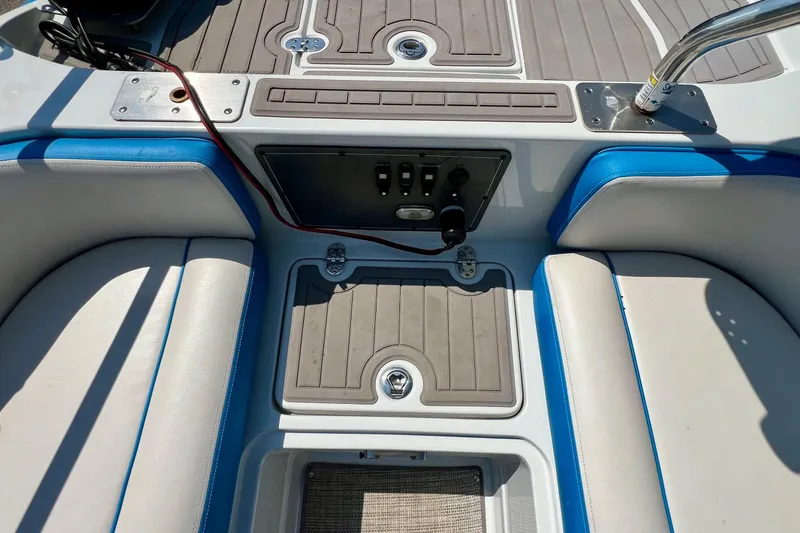 Slide: The Image of 2020 Crownline Eclipse E205 XS Fish boat interior with seating and control panel. - 29