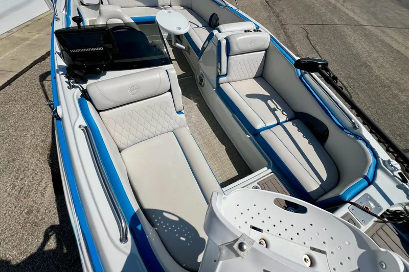 Slide: The Image of 2020 Crownline Eclipse E205 XS Fish boat interior with seating and fishing equipment. - 31