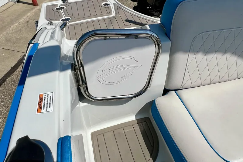 Slide: The Image of 2020 Crownline Eclipse E205 XS Fish boat interior with white and blue seating. - 34