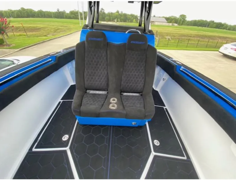 Slide: The Image of 2021 Statement 380 Open boat interior with dual seats and hexagonal floor design. - 6