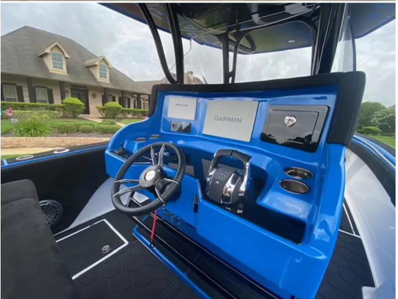 Slide: The Image of Blue helm of 2021 Statement 380 Open boat with Garmin navigation system. - 8