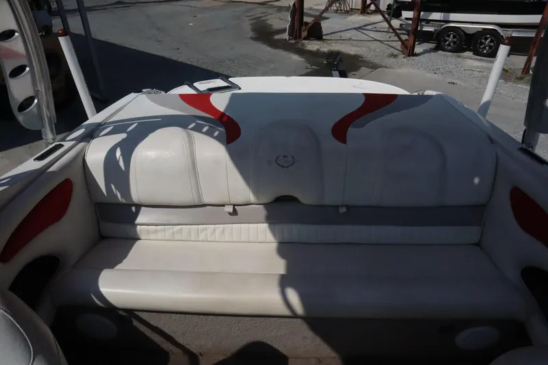 Slide: The Image of 2008 Stingray 195 LS/LX/LR boat interior with white and red seating. - 12