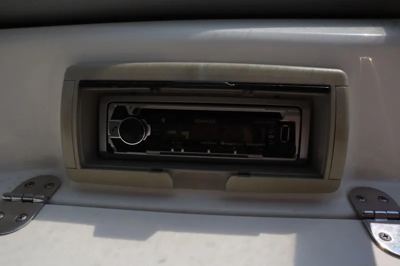 Slide: The Image of Kenwood stereo system in 2008 Stingray 195 LS/LX/LR boat dashboard. - 16