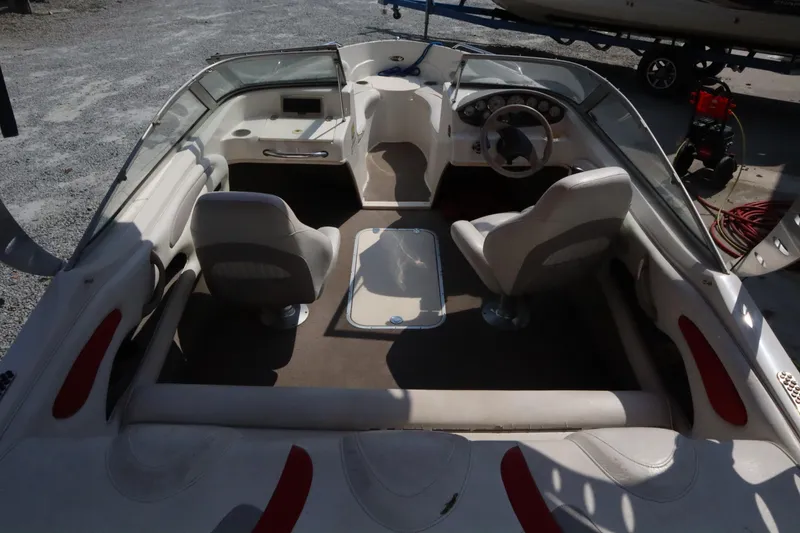 Slide: The Image of 2008 Stingray 195 LS/LX/LR boat interior with seating and steering wheel. - 6