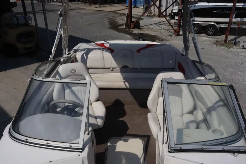 Slide: The Image of 2008 Stingray 195 LS/LX/LR boat interior with white seating and windshield. - 9