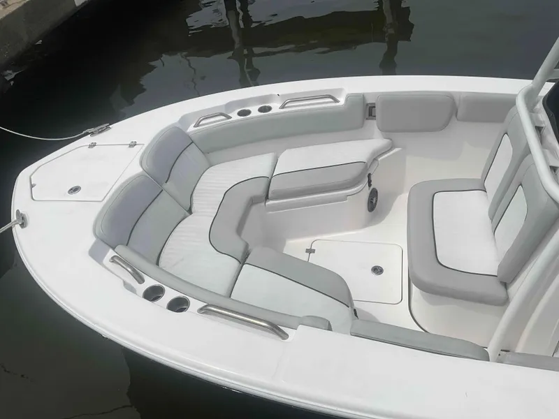 Slide: The Image of 2023 Sea Fox 228 Commander boat console with steering wheel and navigation controls. - 15