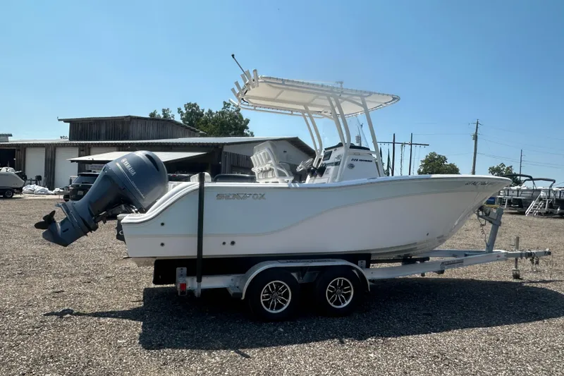 Slide: The Image of 2023 Sea Fox 228 Commander boat interior with seating and steering console. - 28