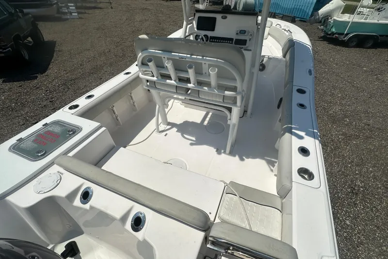 Slide: The Image of 2023 Sea Fox 228 Commander boat console with steering wheel and navigation controls. - 32