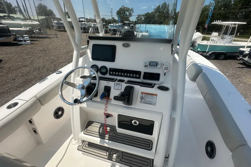 Slide: The Image of 2023 Sea Fox 228 Commander boat dashboard with navigation and communication equipment. - 33