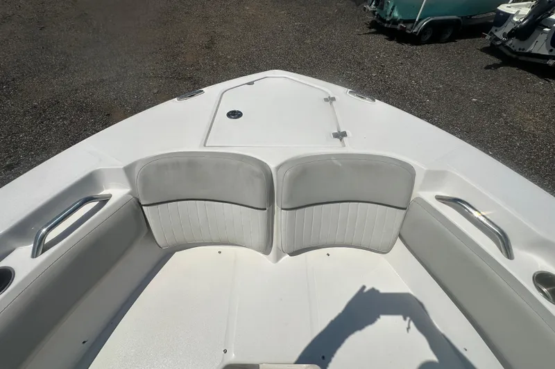 Slide: The Image of 2023 Sea Fox 228 Commander boat interior with seating and life jackets on deck. - 36