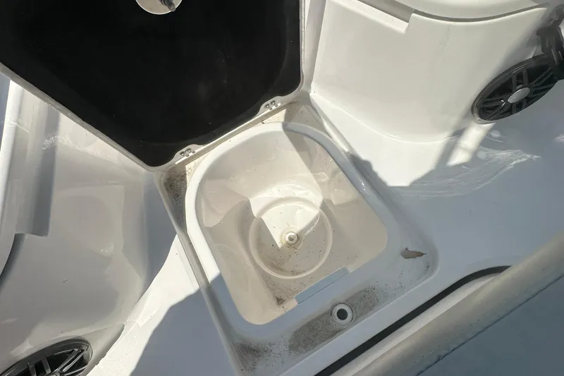 Slide: The Image of 2023 Sea Fox 228 Commander boat interior with white storage compartment. - 38