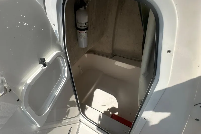 Slide: The Image of 2023 Sea Fox 228 Commander boat interior with dual seating and steering wheel. - 40