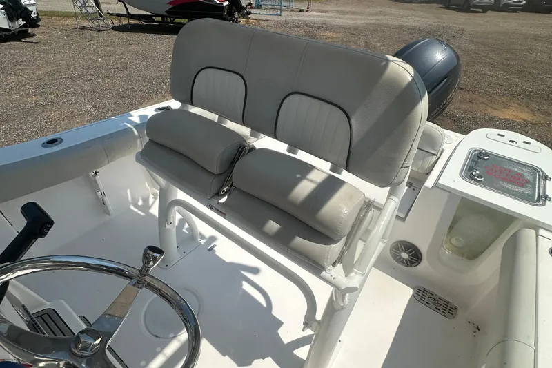 Slide: The Image of 2023 Sea Fox 228 Commander boat interior with dual seats and steering wheel. - 41