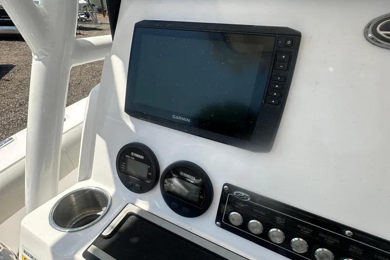 Slide: The Image of 2023 Sea Fox 228 Commander dashboard with Garmin and Yamaha controls. - 51