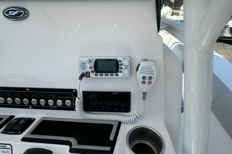 Slide: The Image of 2023 Sea Fox 228 Commander dashboard with Garmin display and compass. - 53