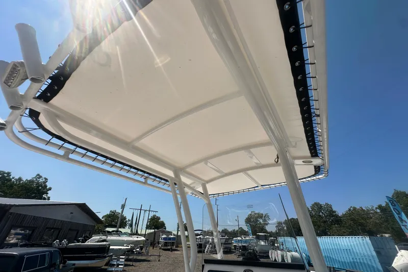 Slide: The Image of 2023 Sea Fox 228 Commander boat interior with control panel and seating area. - 55