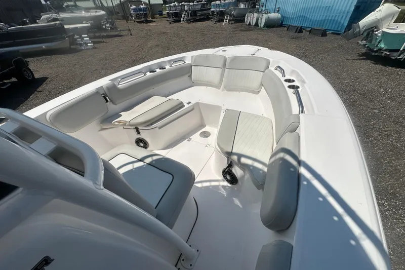 Slide: The Image of 2023 Sea Fox 228 Commander boat interior with cushioned seating and stainless steel handrail. - 57