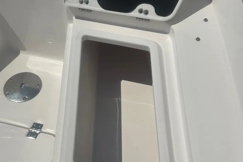 Slide: The Image of Open storage compartment on 2023 Sea Fox 228 Commander boat. - 60
