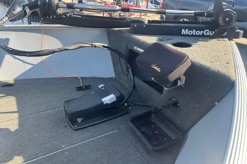 Slide: The Image of 2013 Lund 1600 Fury Tiller boat interior with MotorGuide trolling motor and Cabela's accessory. - 8