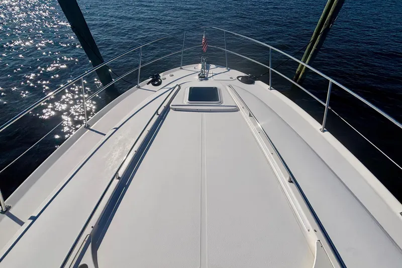 Slide: The Image of 2003 Sea Ray 480 Sedan Bridge yacht deck with ocean view. - 11