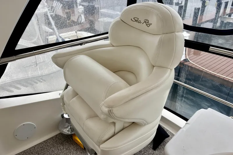 Slide: The Image of Luxurious captain's chair on 2003 Sea Ray 480 Sedan Bridge yacht. - 25