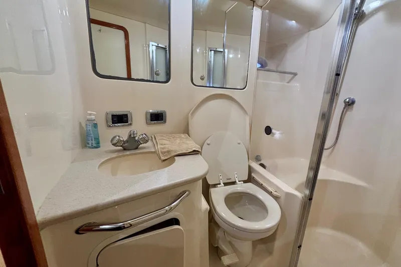 Slide: The Image of Luxurious bathroom in 2003 Sea Ray 480 Sedan Bridge yacht with modern fixtures. - 43