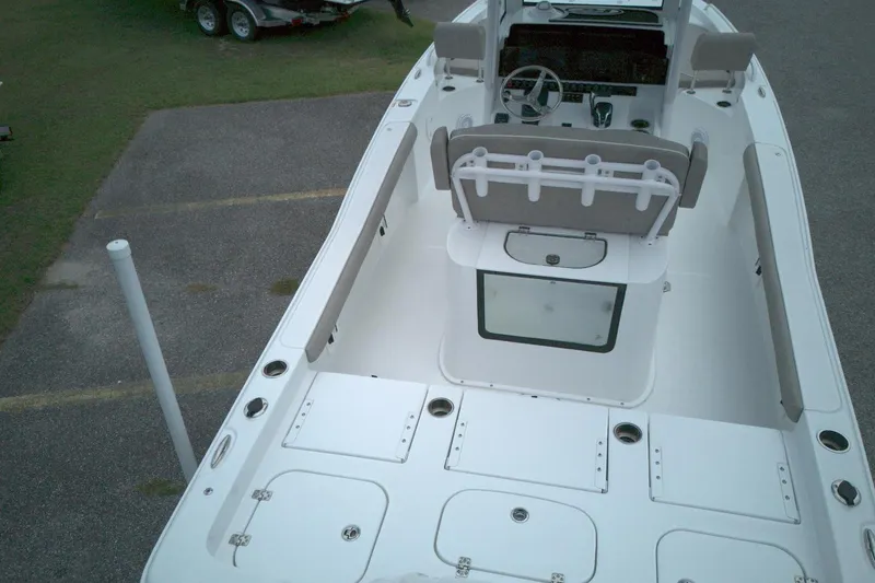 Slide: The Image of 2025 Sea Hunt BX 25 FS boat interior with seating and storage compartments. - 6