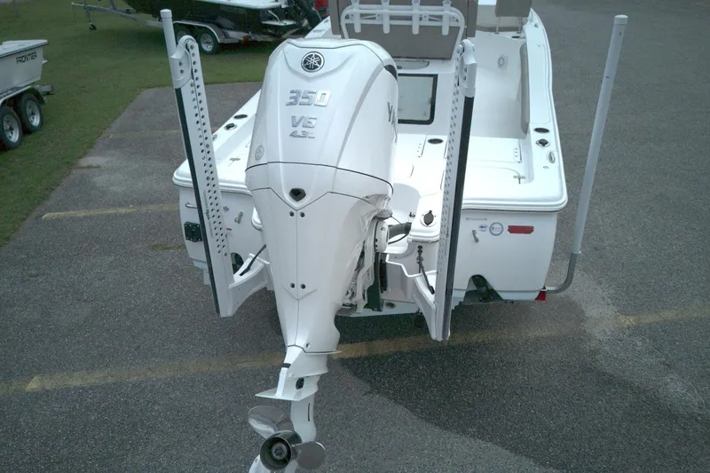 Slide: The Image of 2025 Sea Hunt BX 25 FS boat with Yamaha 350 V6 engine, rear view. - 8